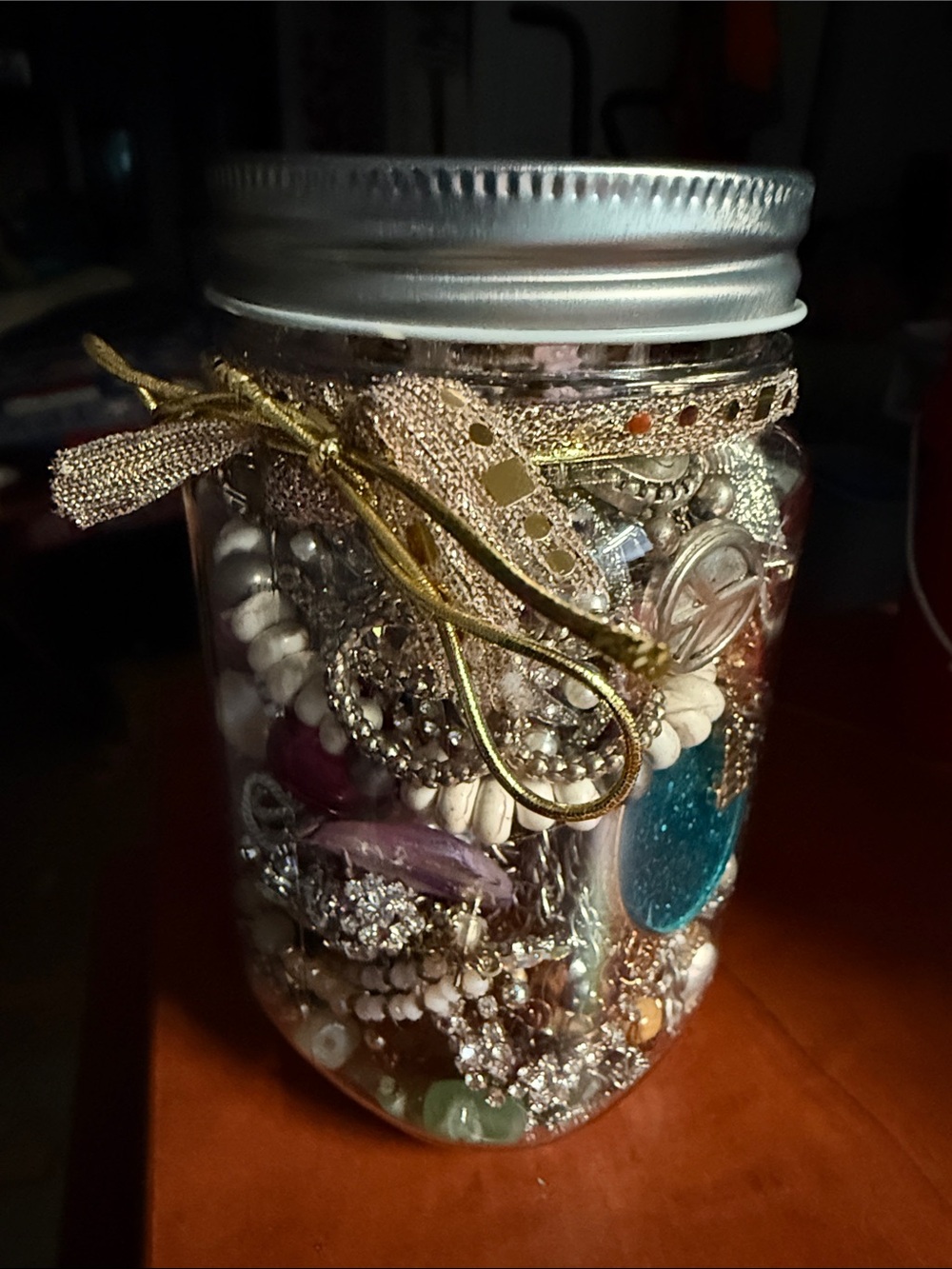 Decorative Gold-Accented plastic Jar with Mixed Jewelry Fill